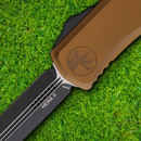Microtech Auto Hera II D/E Folding Knife 4" Double Edge Premium Steel Blade Tan Aluminum Handle